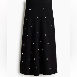 Elegant Black Skirt with Silver Stuffed Accents